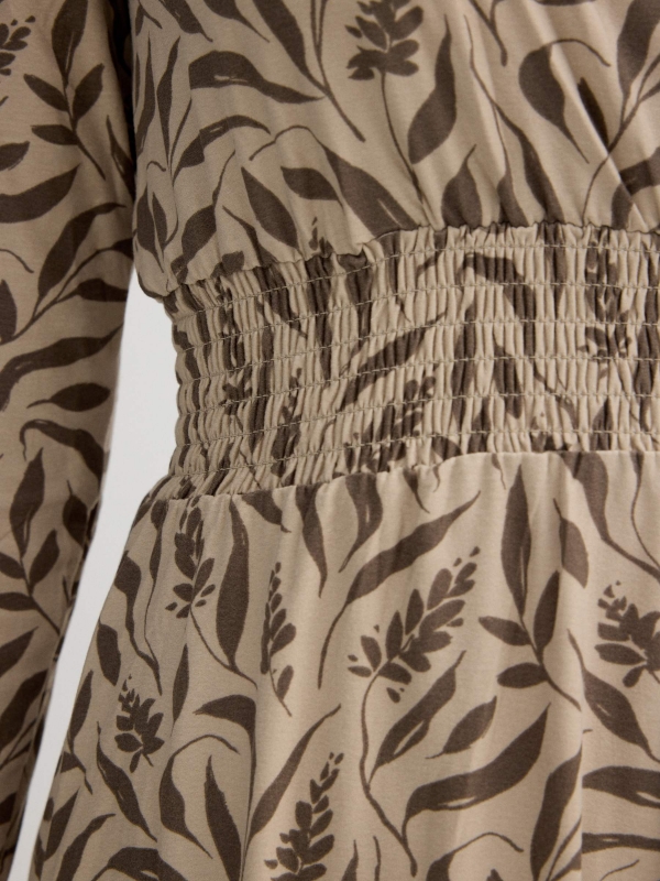 Midi dress with leaf print raw detail view
