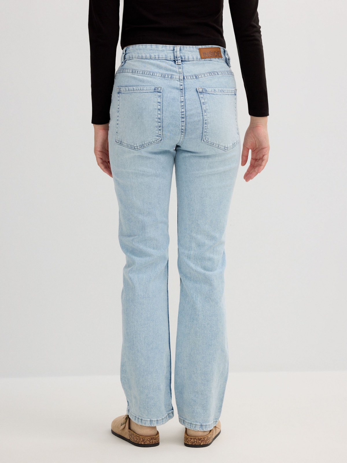Light blue high rise straight jeans light blue middle back view