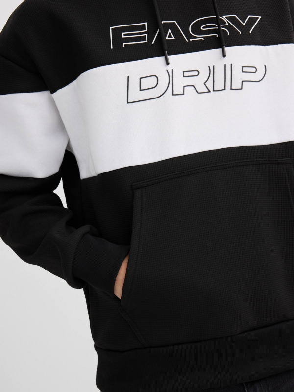White and black color block hoodie black detail view