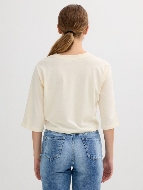 Camiseta estampa musa off white vista meia traseira