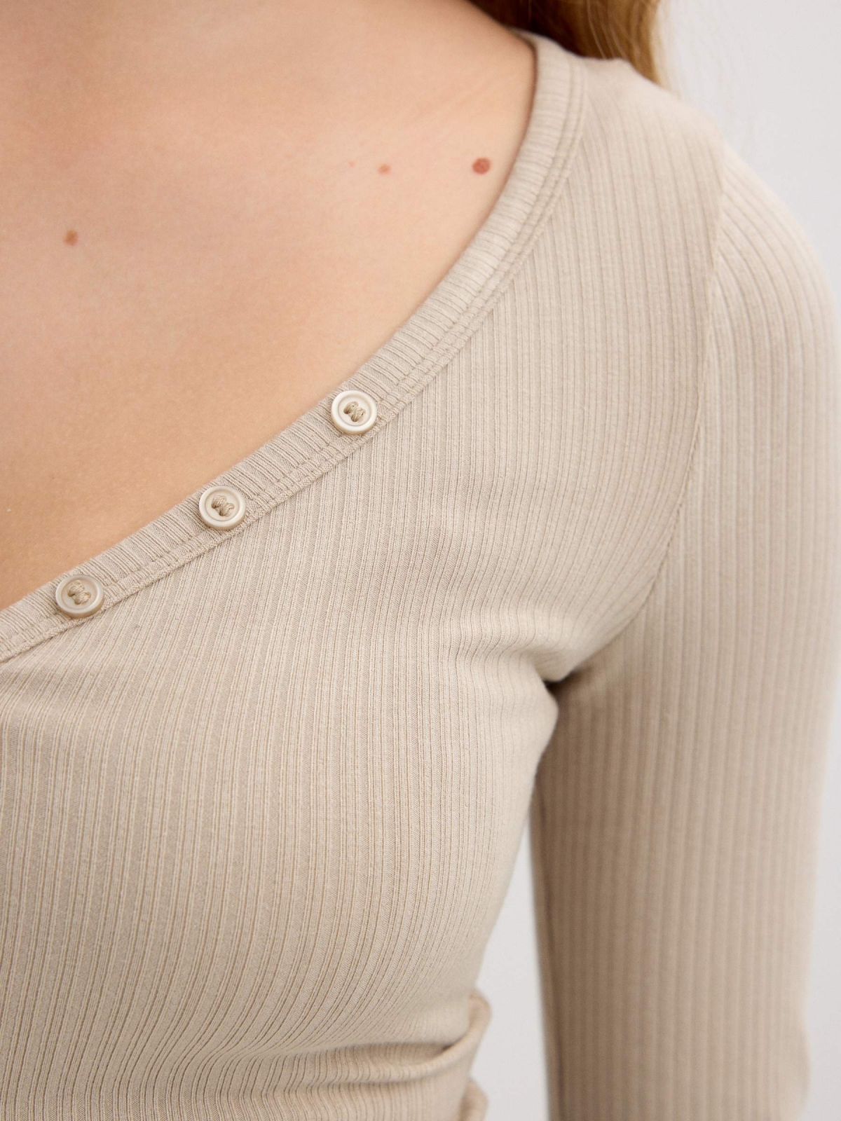 Ribbed button long sleeve shirt raw detail view