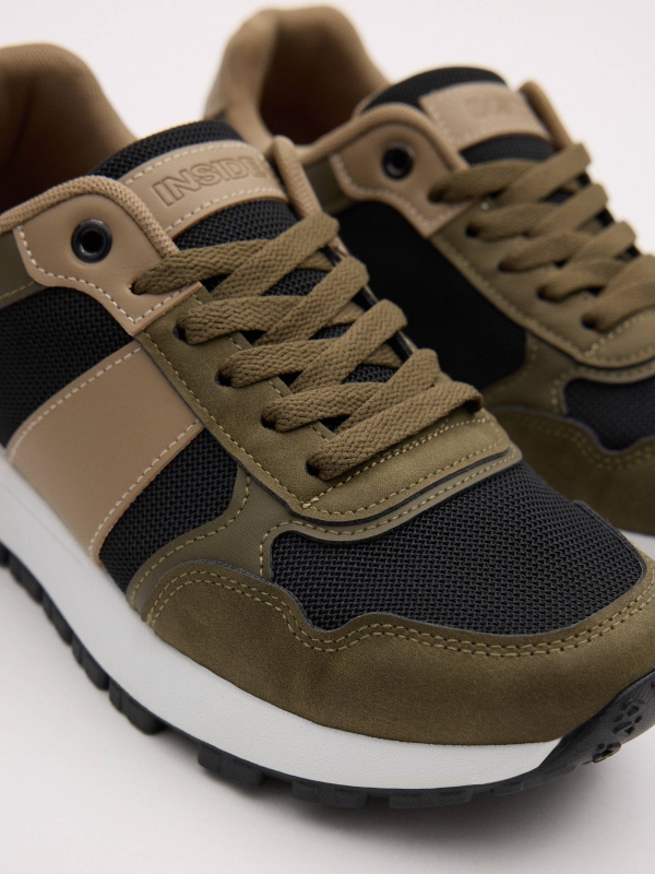 Combined sports shoe black detail view