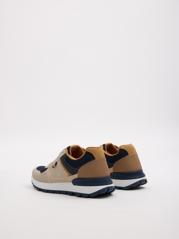 Zapatilla deportiva combinada marino crudo vista trasera 45º