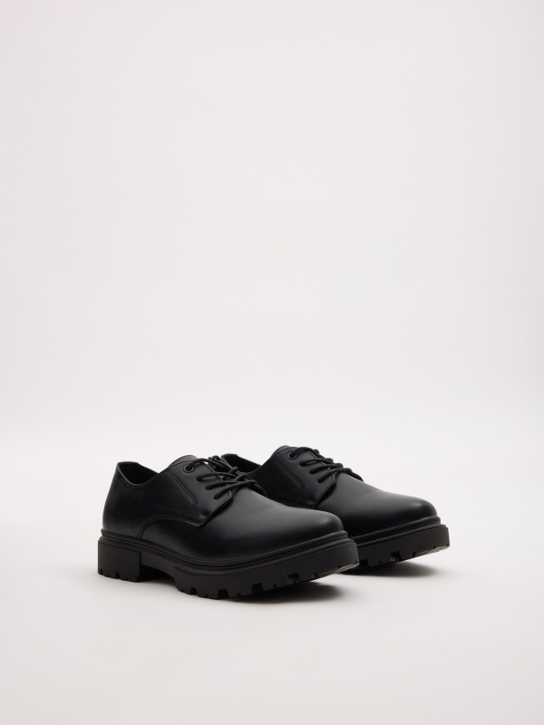 Zapato de vestir suela dentada negro vista frontal 45º
