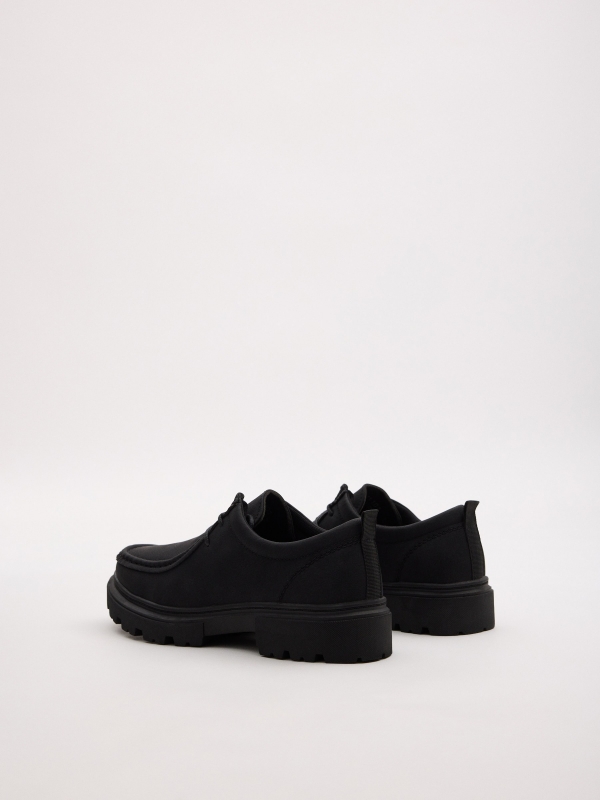 Zapato vestir bordón negro vista trasera 45º