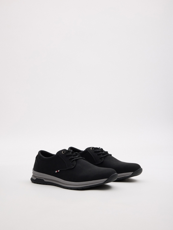 Zapato clásico deportivo negro negro vista frontal 45º