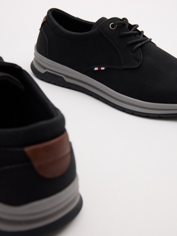Zapato clásico deportivo negro negro vista detalle