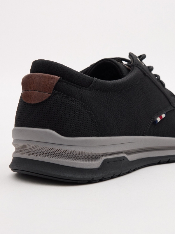 Zapato clásico deportivo negro negro vista detalle