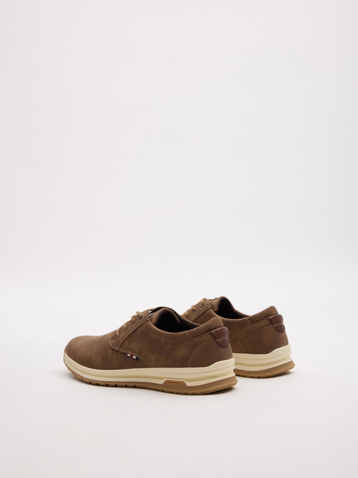 Classic brown sports shoe dark brown 45º back view