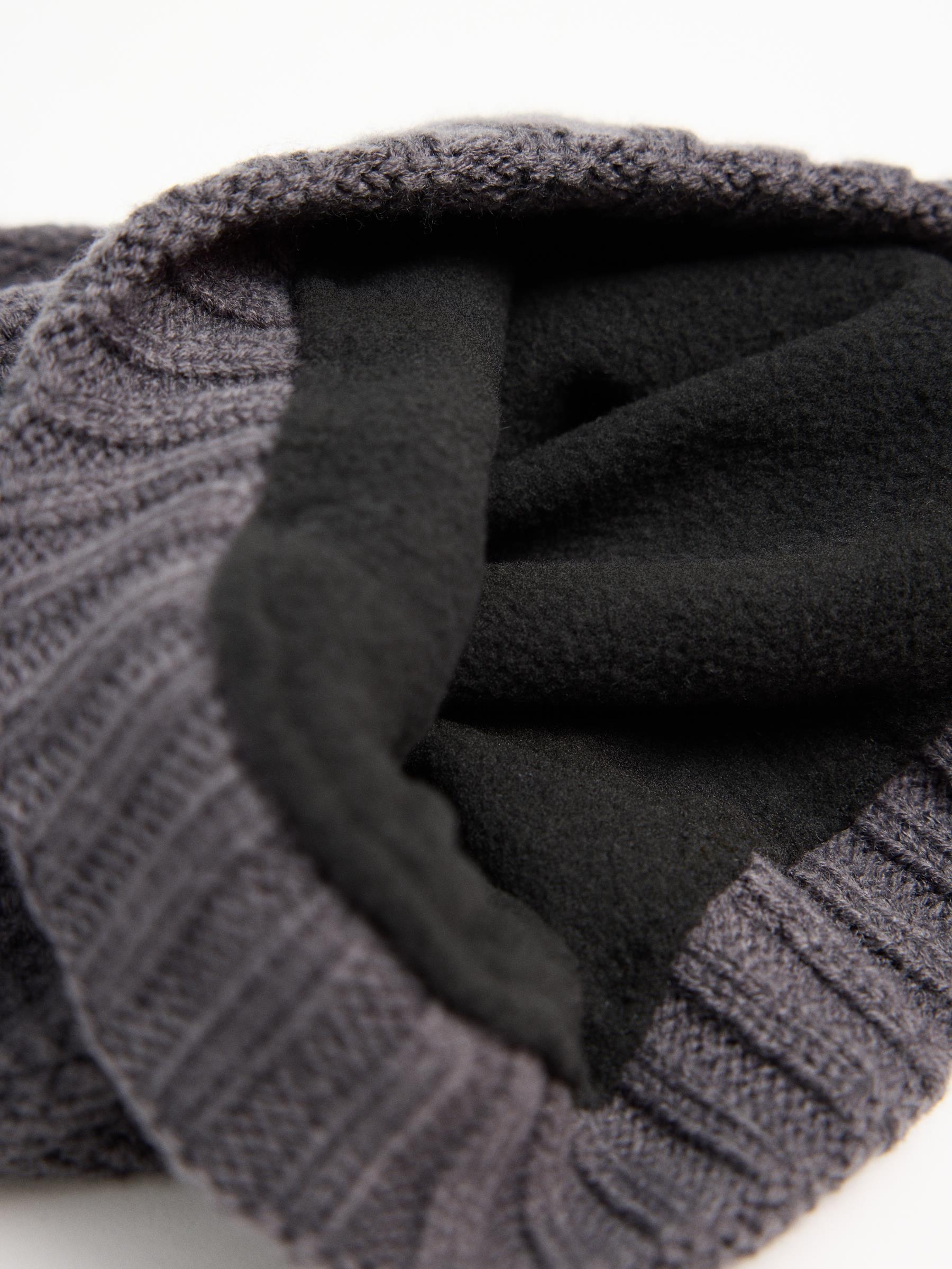 Polar fleece knit hat dark melange 45º back view
