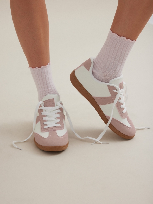 Retro low pink sneakers off white with a model