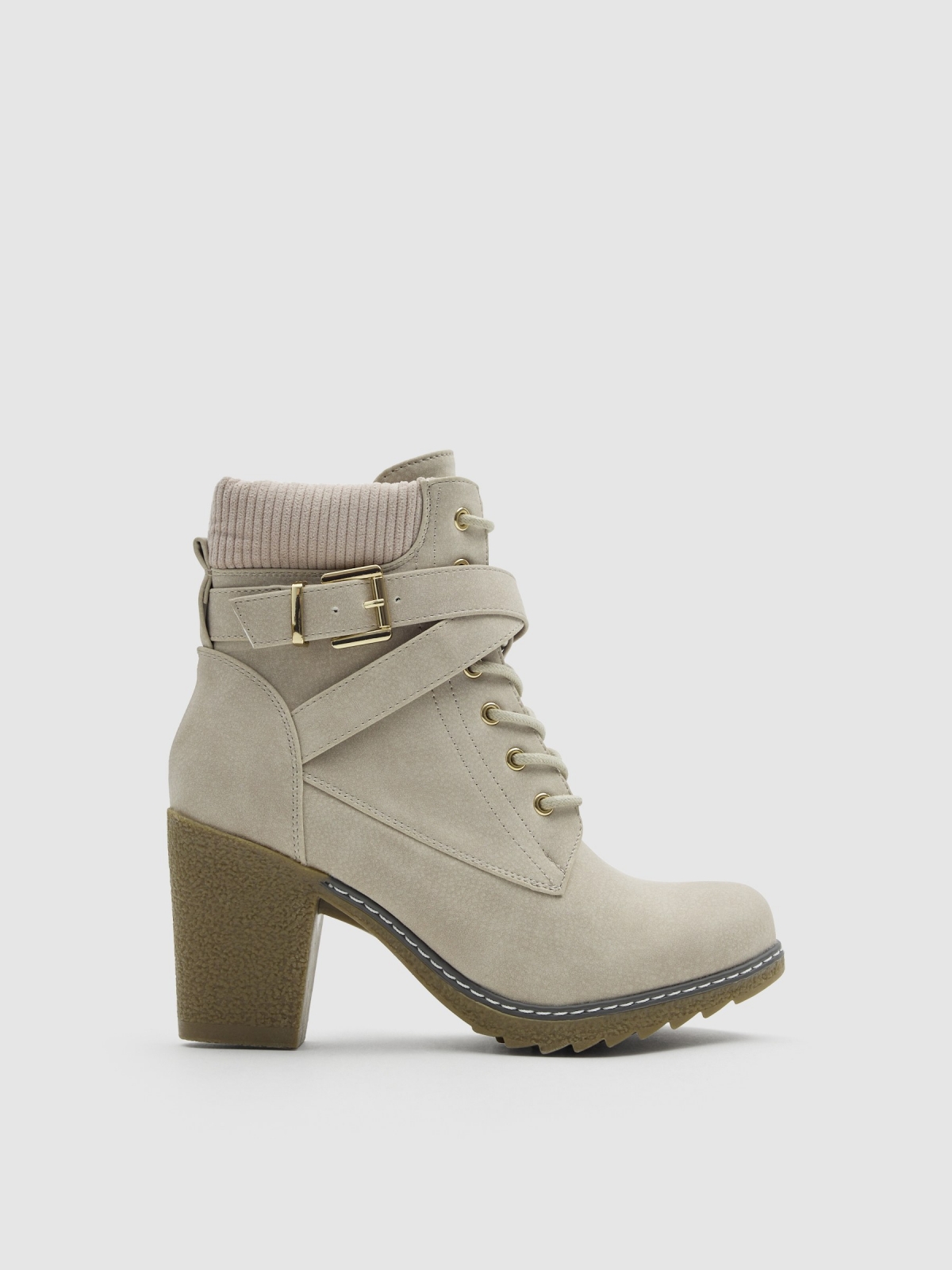 Lace-up heeled boot with crossed straps raw