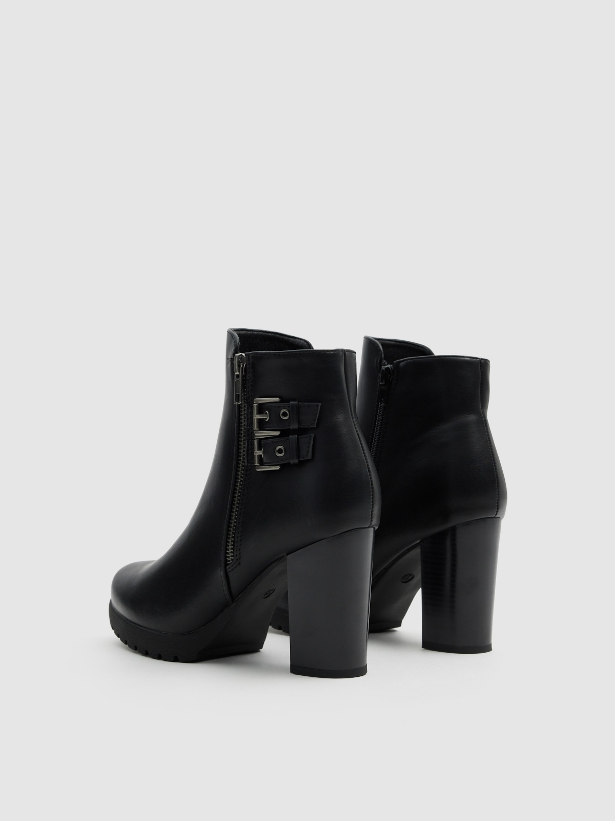 High heel buckle boot black 45º back view