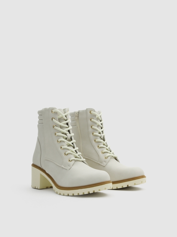 Lace-up heeled boot raw 45º front view