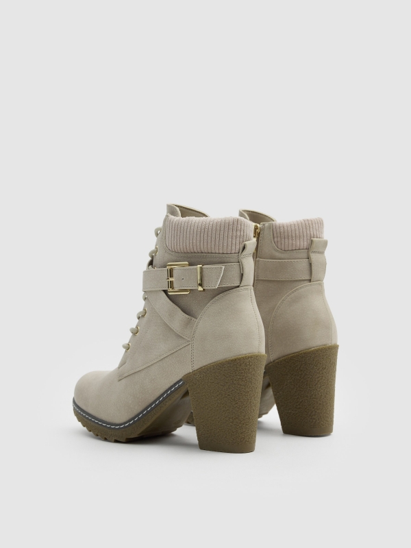 Lace-up heeled boot with crossed straps raw 45º back view
