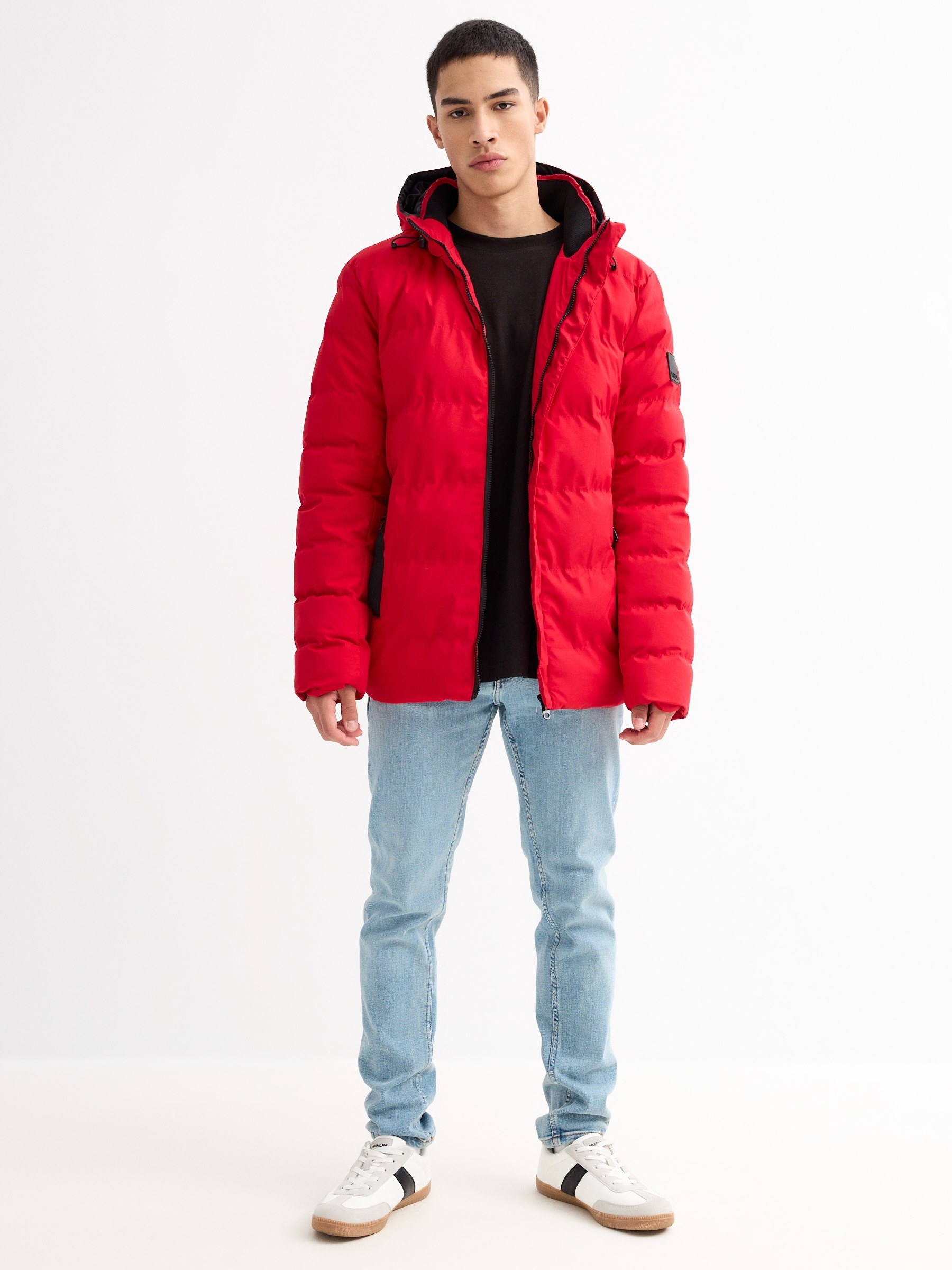 Black padded jacket red middle front view