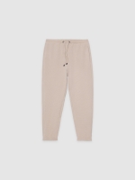 %Pto% Jogger desportivo felpudo bege crua vista frontal