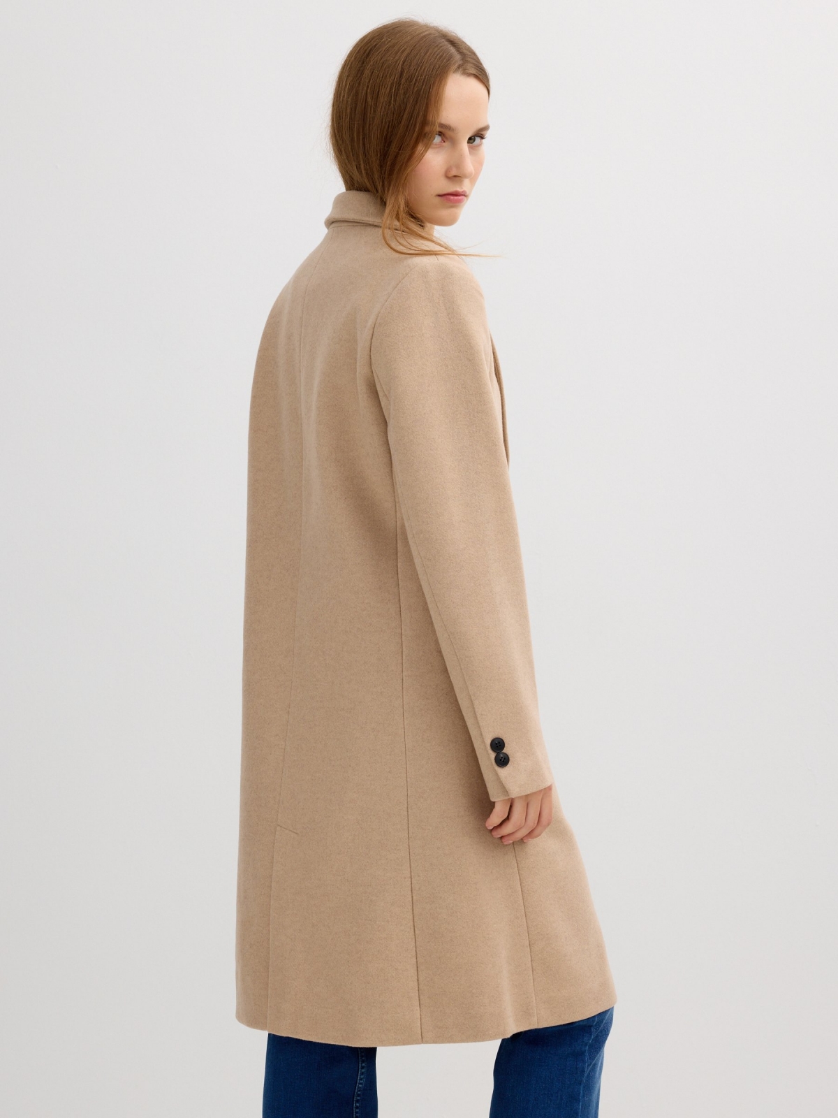 Beige cloth coat sand middle back view