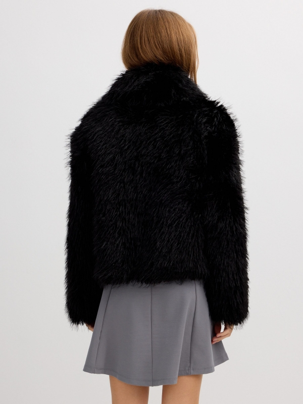Faux fur effect jacket with lapel collar black middle back view