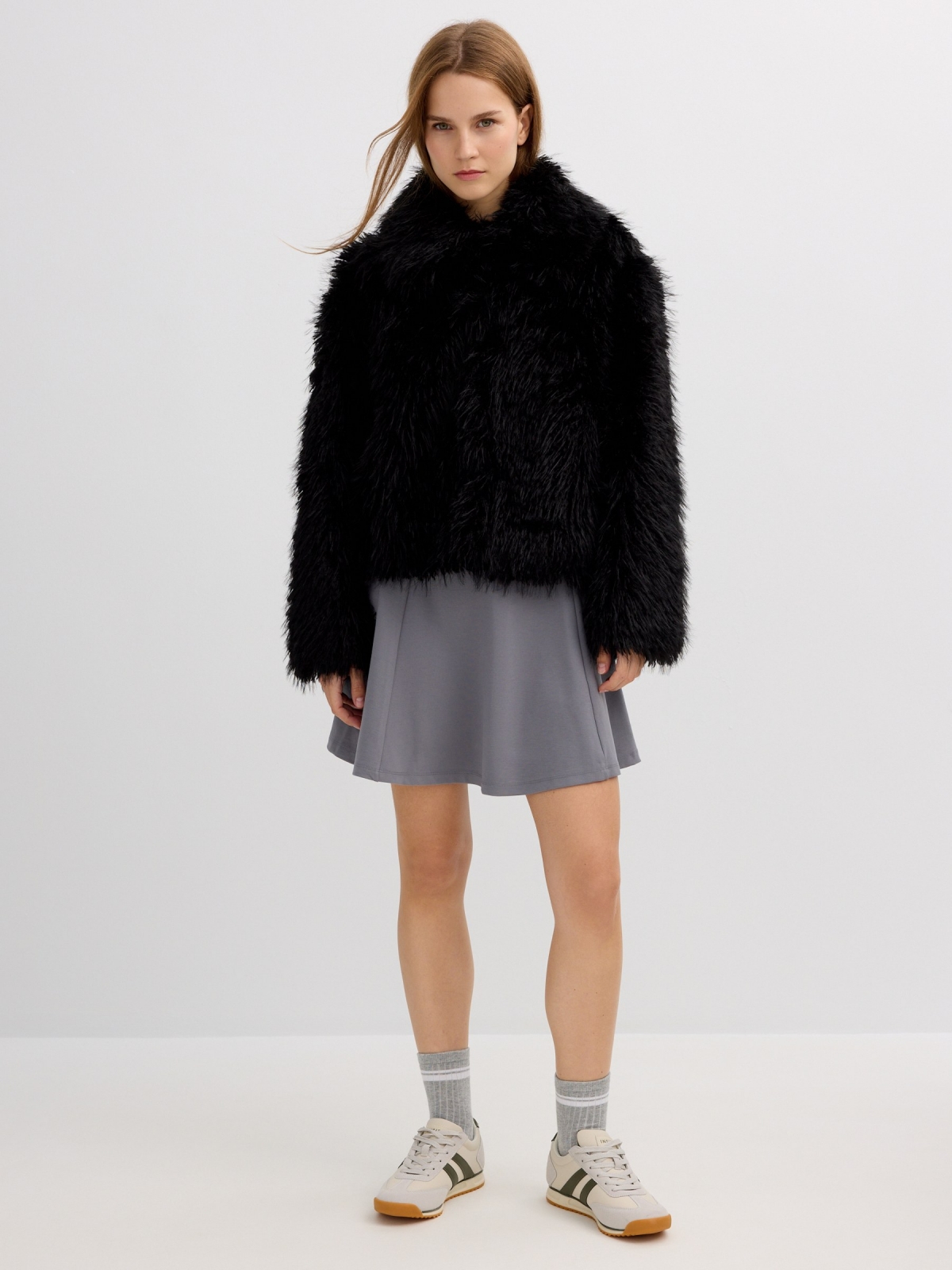 Faux fur effect jacket with lapel collar black front view