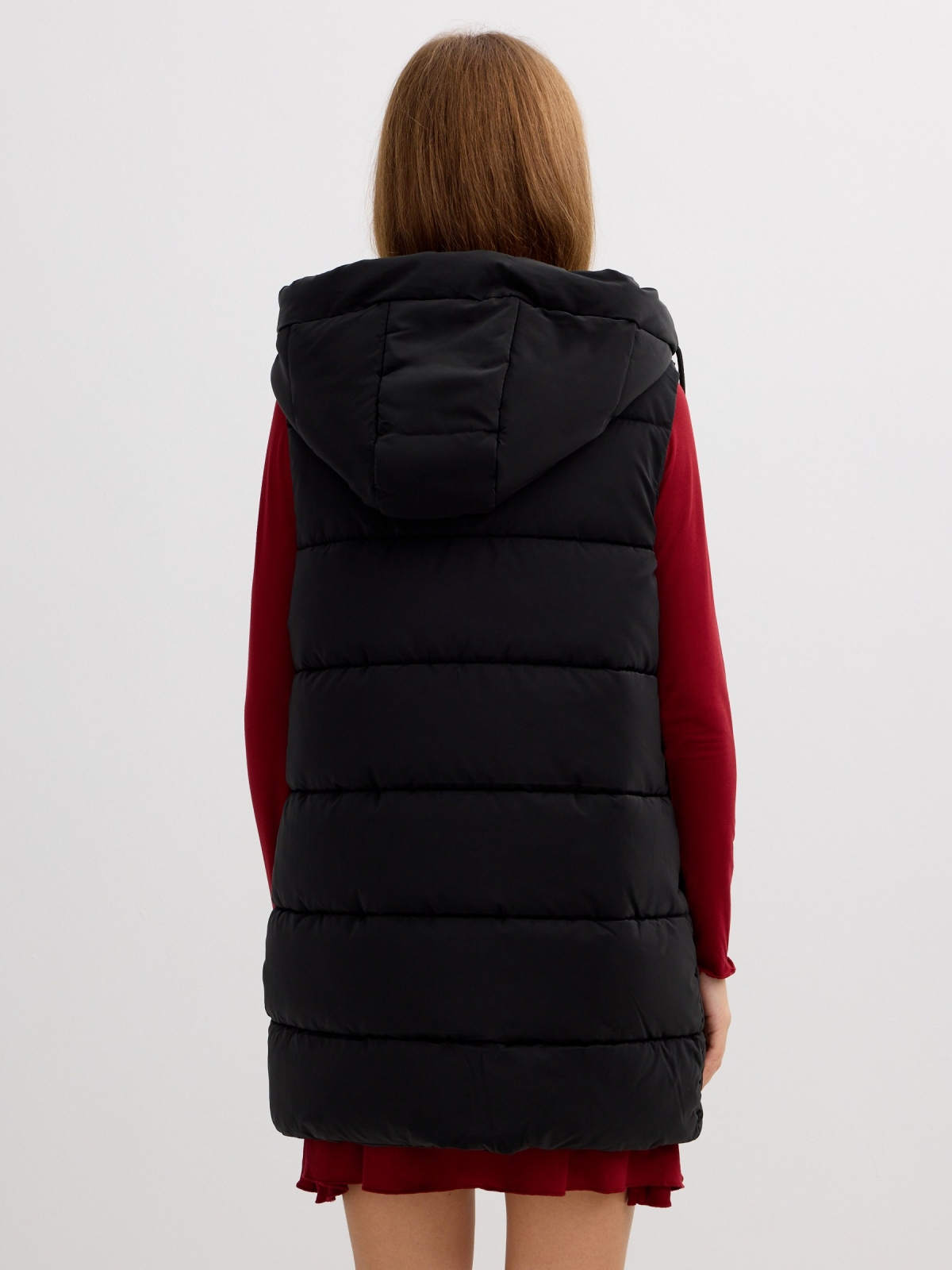 Long padded vest with hood black middle back view
