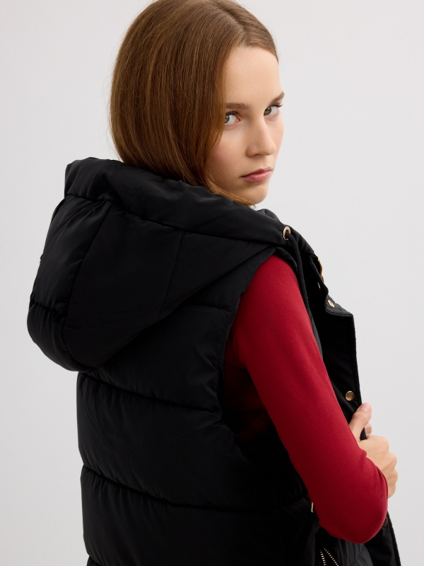 Long padded vest with hood black detail view