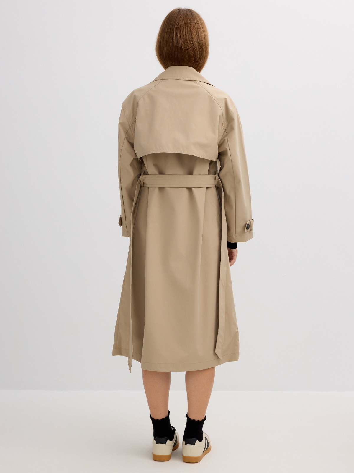 Long trench coat sand middle back view