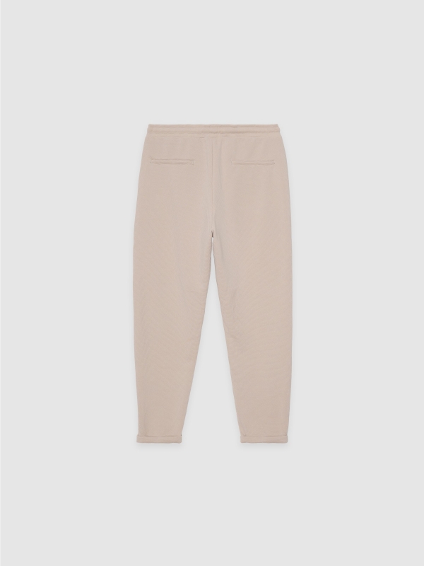 Jogger desportivo felpudo bege crua vista traseira