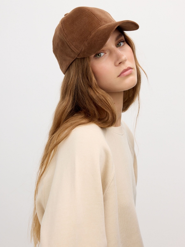 Microfiber cap brown with a model