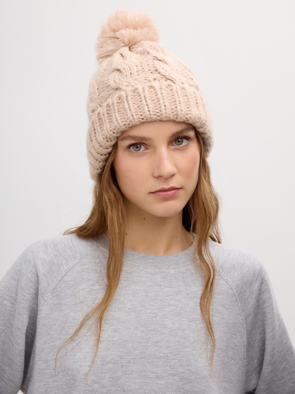 Nude hat with pompom nude pink with a model