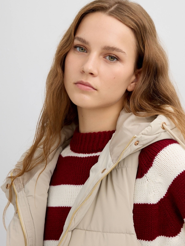 Long padded vest with hood taupe detail view