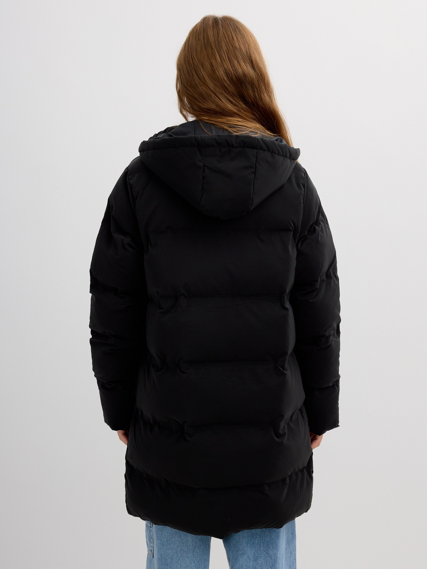 Long padded anorak with hood black middle front view