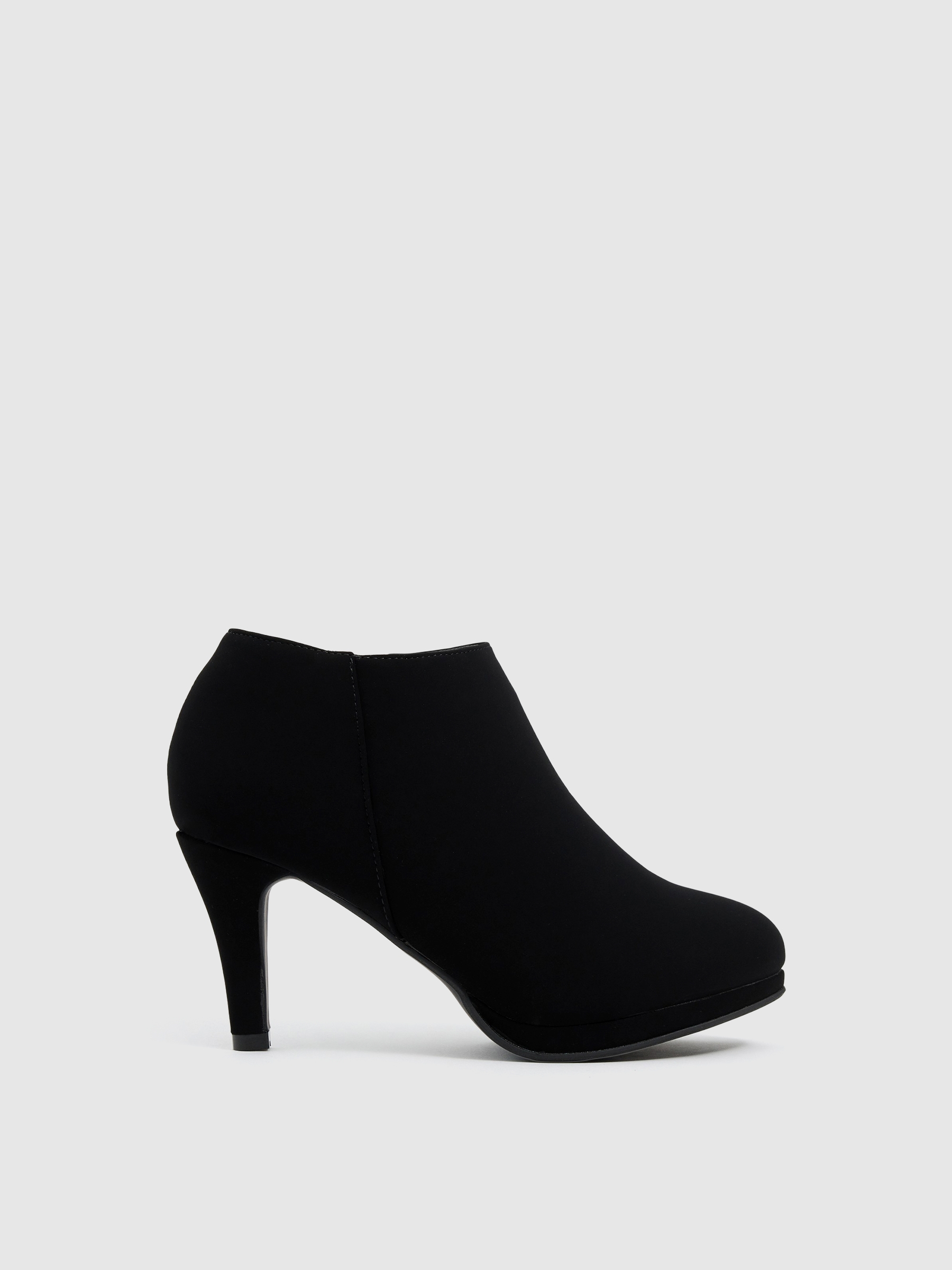 Botines tacón fino con cremallera negro