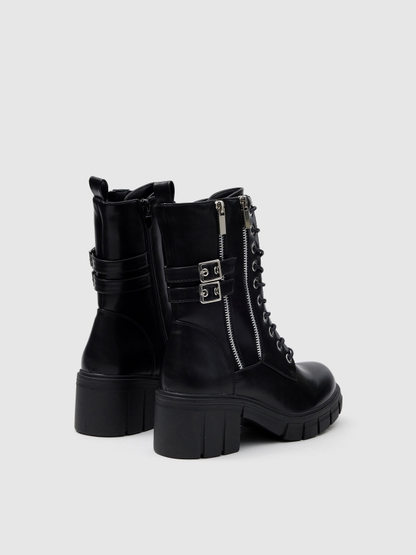 Ankle boots with studs and buckles black 45º back view