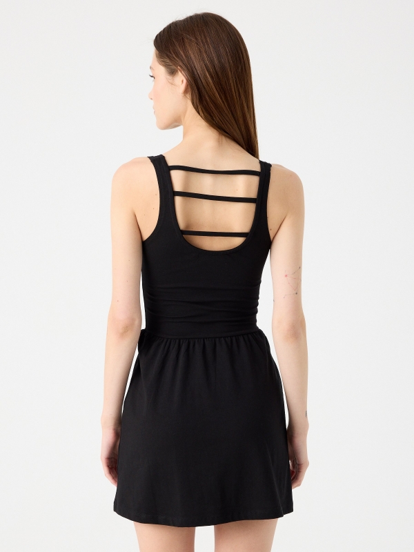Dress with strap back black three-quarter back view