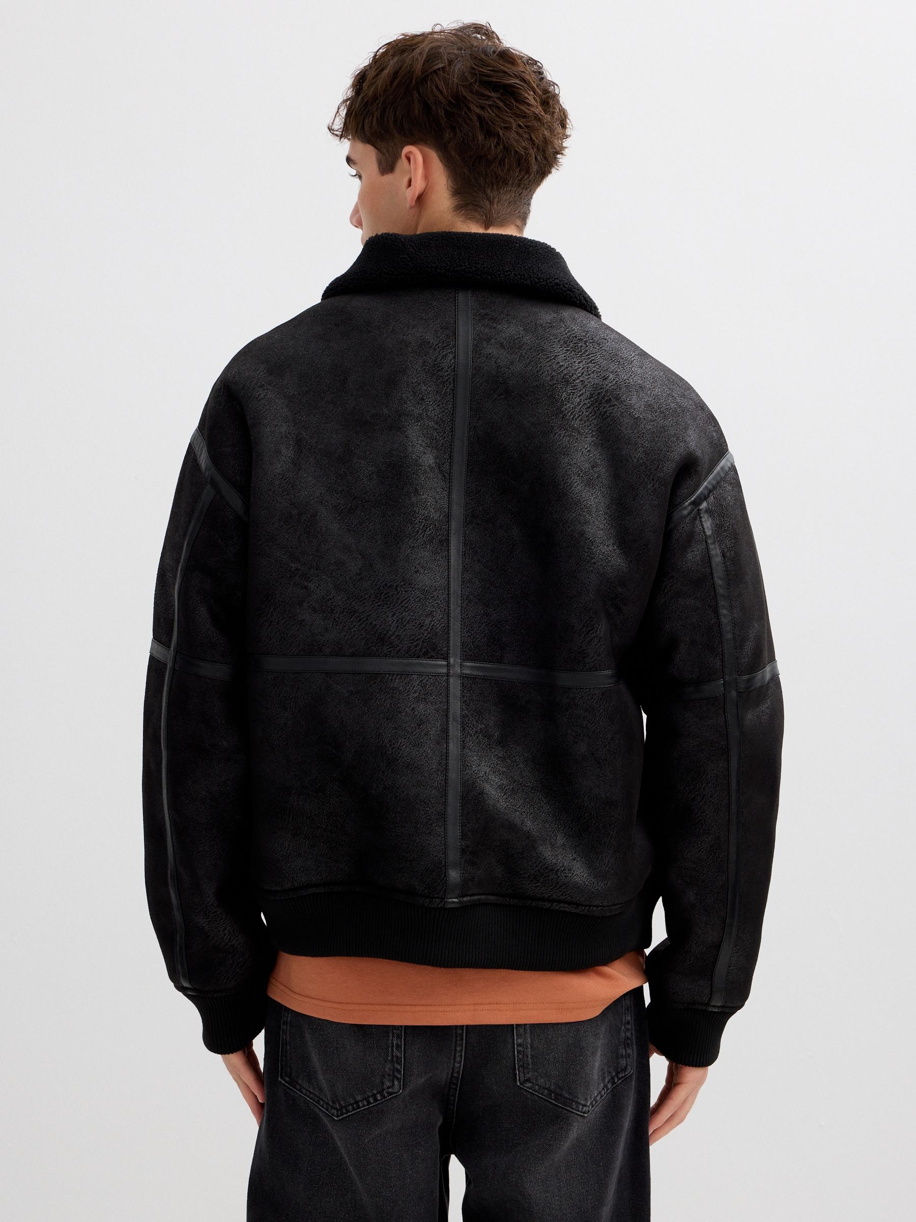 Faux leather jacket combined with shearling black middle front view
