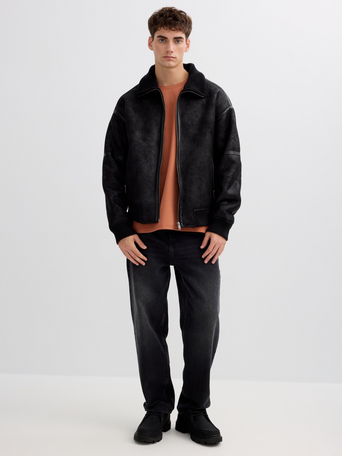 Faux leather jacket combined with shearling black front view