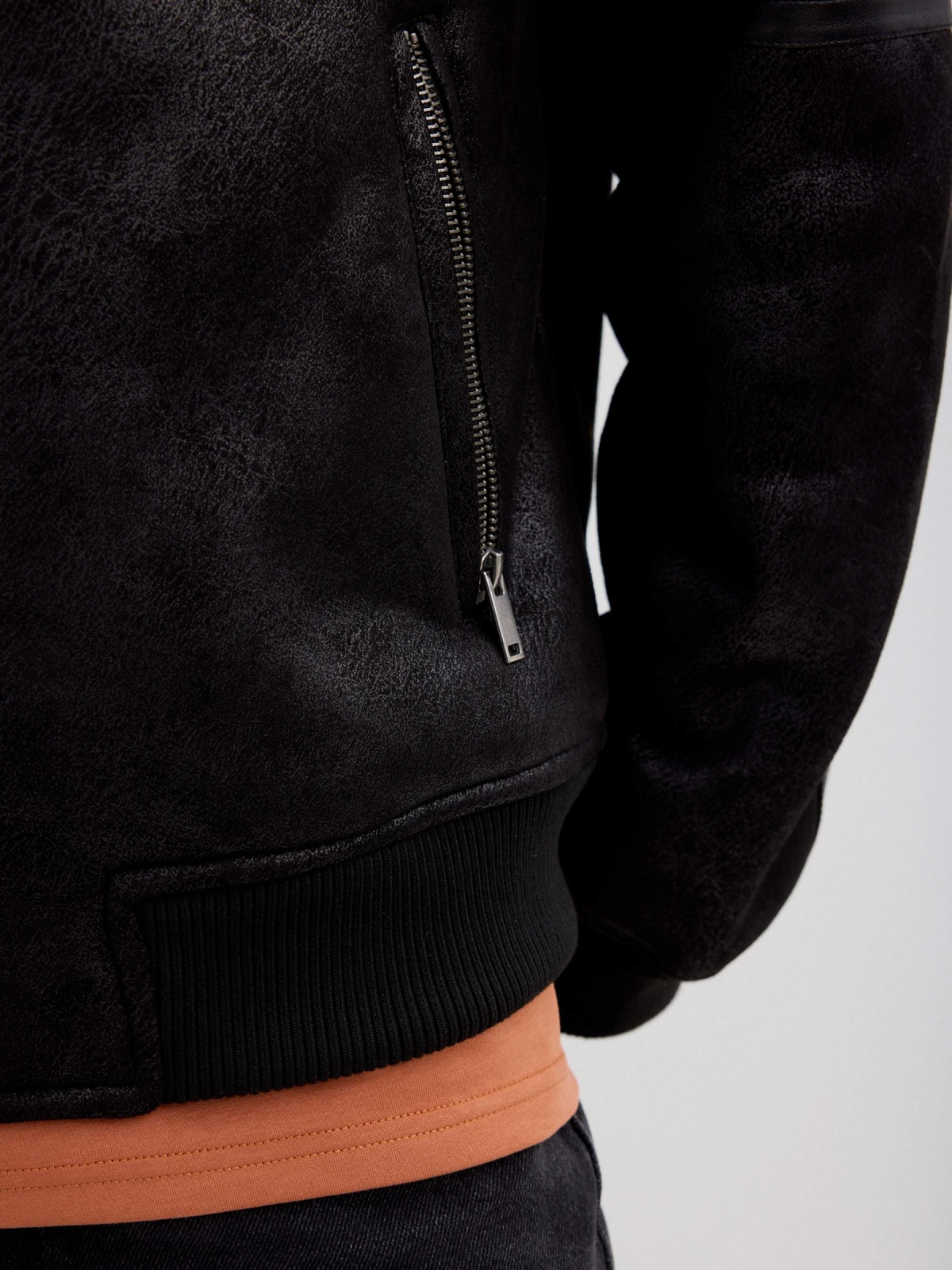 Faux leather jacket combined with shearling black detail view