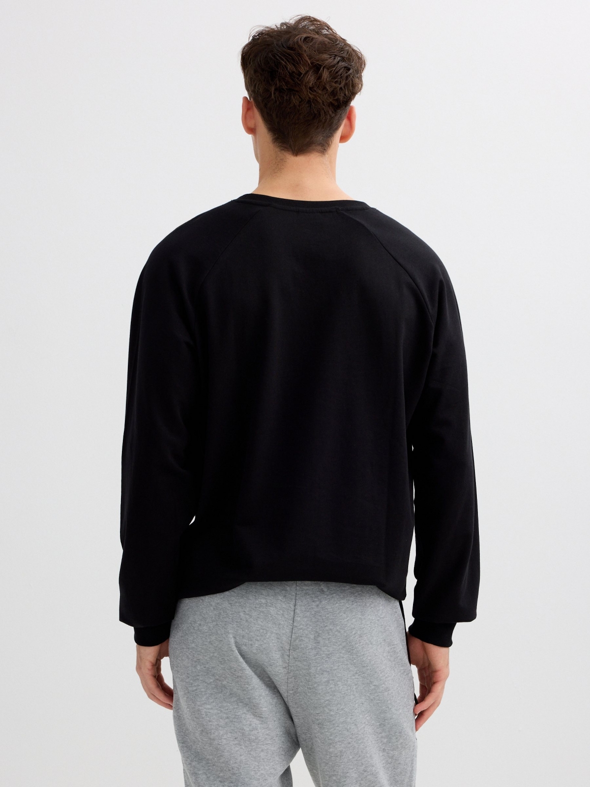 Basic sweatshirt with text black middle back view