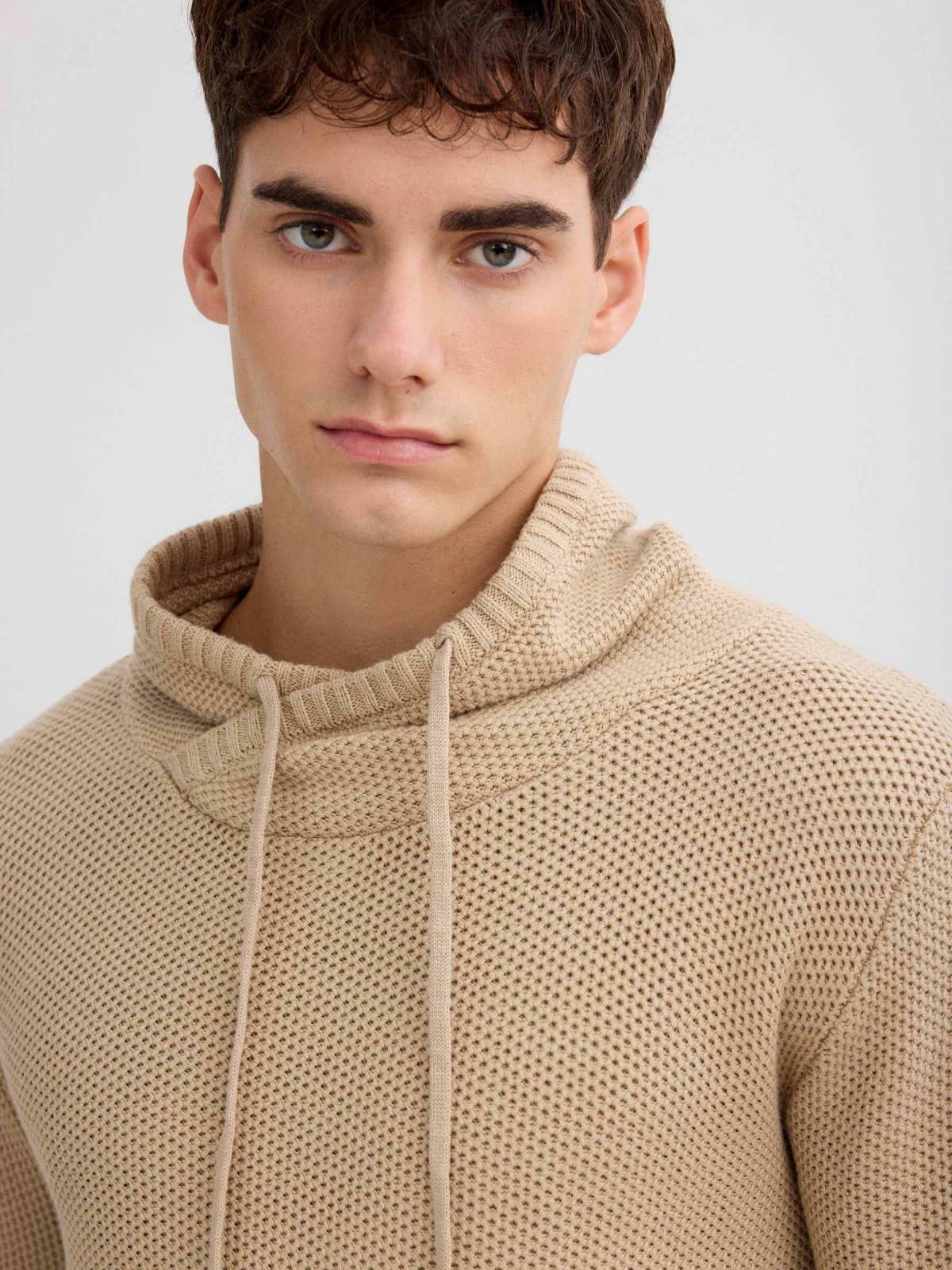 Plain knit sweater sand detail view