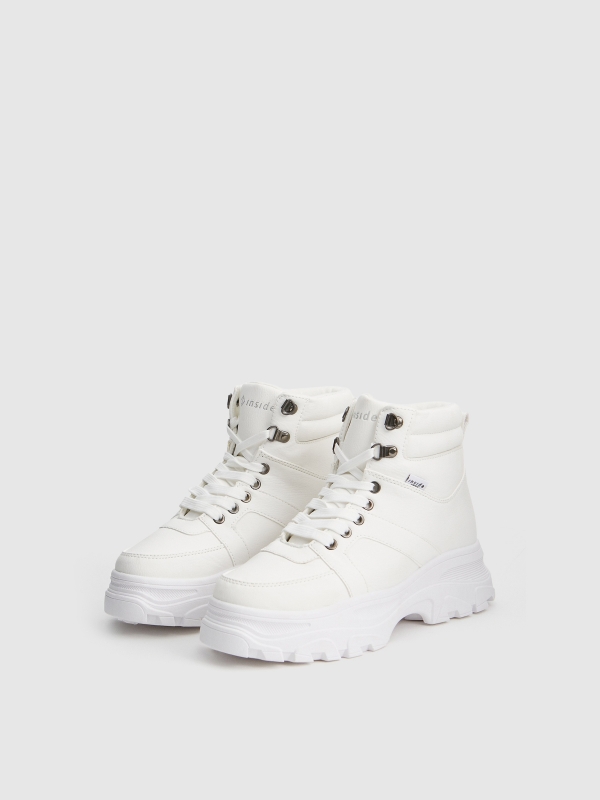 Botas con plataforma dentada blanco vista frontal 45º