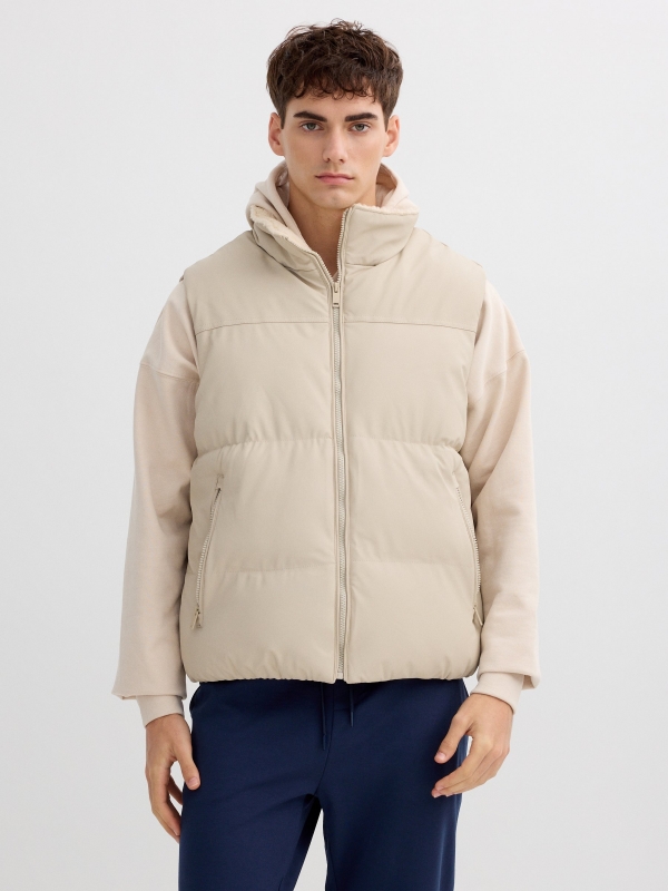 Beige padded nylon vest raw middle front view