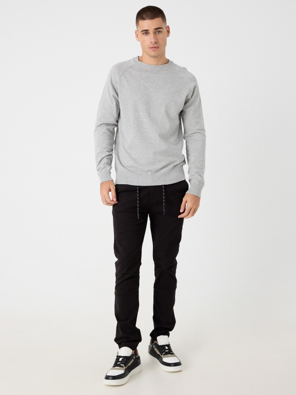 Knotted jogger pants black front view