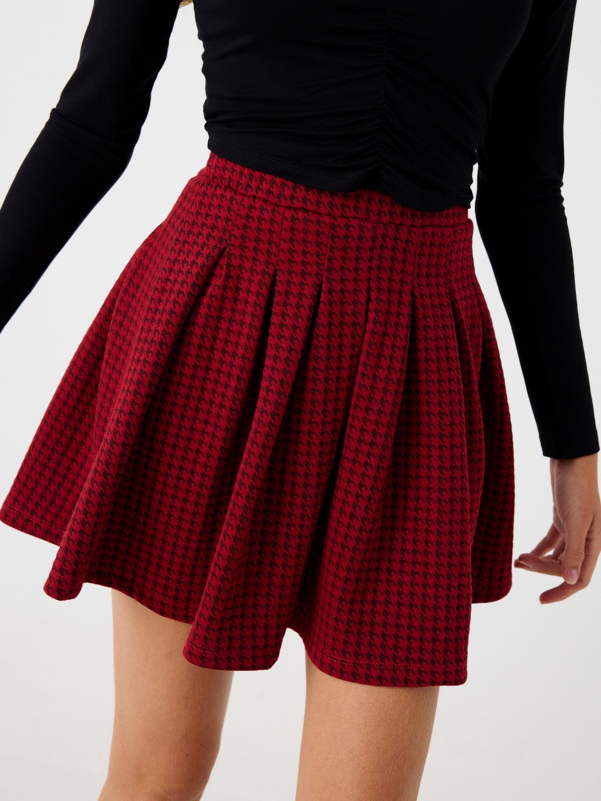 Houndstooth flared skirt garnet detail view