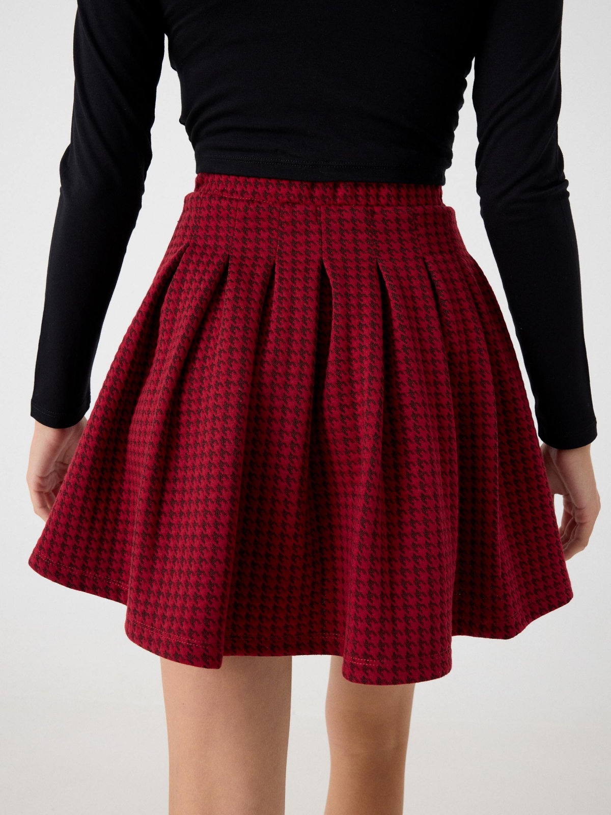 Houndstooth flared skirt garnet detail view