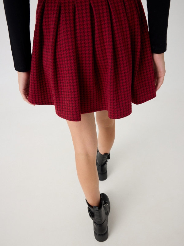 Houndstooth flared skirt garnet detail view