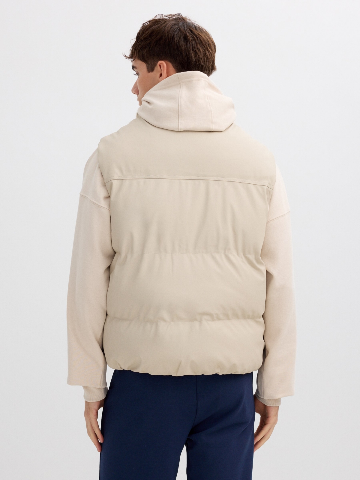 Beige padded nylon vest raw middle back view