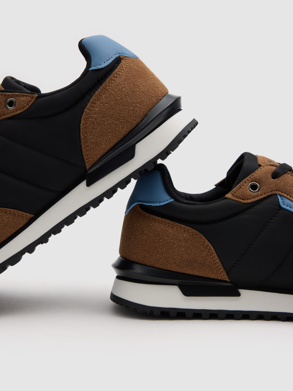 Corrida desportiva combinada preto vista detalhe