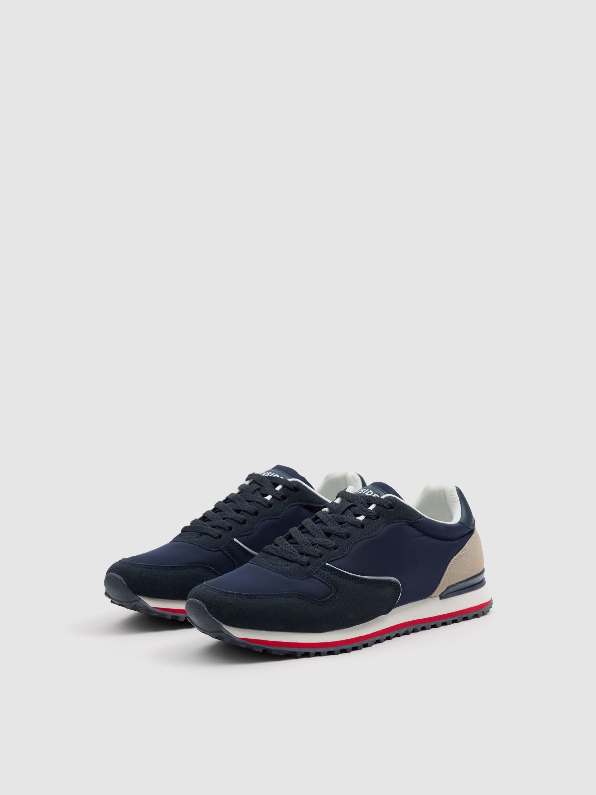 Desportiva nylon corrida azul marinho vista frontal 45º