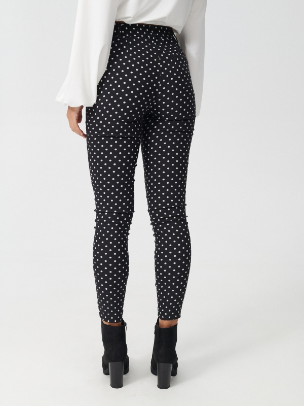 Stretch polka dot print trousers black